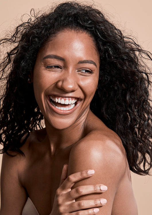 young brunette beysis model smiling and laughing