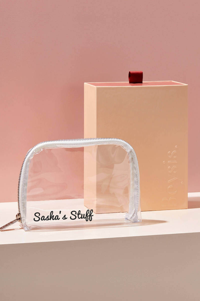 clear travel makeup bag madewell Carry-on CALPAKs clear Small Crystalline Half-Moon Pouch |