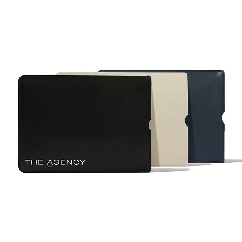 Beysis vegan leather laptop cases in black, stone and navy, the front case branded with a company logo